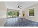 Screened porch with bluestone floor, ceiling fan, and access to backyard and kitchen at 2410 Armstrong Park Dr, Gastonia, NC 28054