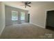 Cozy bedroom with plush carpeting and an abundance of natural light from the large windows at 28770 Hwy 73 Hwy, Albemarle, NC 28001
