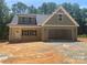Charming new construction home with a two car garage and inviting front porch at 28770 Hwy 73 Hwy, Albemarle, NC 28001