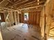 Exposed wooden framework and flooring are seen in this unfinished interior space at 28770 Hwy 73 Hwy, Albemarle, NC 28001