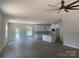 Open-concept living and kitchen space with new hardwood floors and recessed lighting at 28770 Hwy 73 Hwy, Albemarle, NC 28001