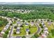 Residential neighborhood with single-Gathering homes and lush green trees in a well-planned community at 3038 Old Ironside Dr, Charlotte, NC 28213