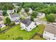 An aerial view of the neighborhood, showcasing the home's location and surrounding landscape at 3038 Old Ironside Dr, Charlotte, NC 28213