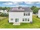 Home boasts solar panels on its roof, complemented by a spacious backyard at 3038 Old Ironside Dr, Charlotte, NC 28213