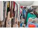Walk-in closet with extensive hanging space for clothes, providing ample storage at 3038 Old Ironside Dr, Charlotte, NC 28213