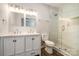 Bright bathroom featuring double sink vanity, modern fixtures, and large walk-in shower at 3050 Millstone Dr, Gastonia, NC 28054