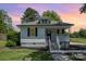 Charming home featuring vinyl siding, black shutters, and a welcoming front porch with stairs at 3050 Millstone Dr, Gastonia, NC 28054