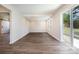 Spacious living room featuring wood-look floors and bright natural light at 3050 Millstone Dr, Gastonia, NC 28054