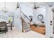 Spacious foyer with staircase, view of living room, and entry to dining area at 317 Marietta Rd, Mooresville, NC 28117