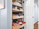 Walk-in pantry with pull-out shelves for easy organization and access at 317 Marietta Rd, Mooresville, NC 28117