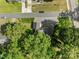 A bird's-eye view of the property with mature trees at 319 N Central Ave, Locust, NC 28097