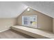Attic bedroom with carpet, window, and recessed lighting at 319 N Central Ave, Locust, NC 28097