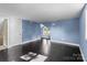 This bedroom boasts sleek hardwood floors, a built-in window seat, and a charming dormer window at 319 N Central Ave, Locust, NC 28097