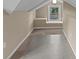 Attic bedroom with carpet and window at 319 N Central Ave, Locust, NC 28097