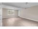 Spacious bonus room with modern floors and ample natural light at 319 N Central Ave, Locust, NC 28097