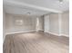 Bonus room with contemporary flooring, neutral paint, and multiple light sources at 319 N Central Ave, Locust, NC 28097