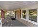 Inviting covered front porch with stone pillars and ample space for outdoor enjoyment at 319 N Central Ave, Locust, NC 28097