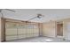 A spacious garage with an automatic door opener, overhead storage and easy interior home access at 319 N Central Ave, Locust, NC 28097