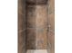 This shower features stylish brown tiles and modern fixtures creating a luxurious showering experience at 319 N Central Ave, Locust, NC 28097