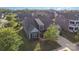 Aerial view of a single-Gathering home with a well-manicured lawn, mature trees, and an inviting curb appeal at 3267 Lock Erne Ave, Kannapolis, NC 28081