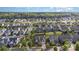 An overhead view highlights a residential area with well-maintained homes and green spaces on a sunny day at 3267 Lock Erne Ave, Kannapolis, NC 28081