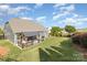 Aerial view of the property showing the spacious backyard with a gazebo and well-manicured landscaping at 3267 Lock Erne Ave, Kannapolis, NC 28081