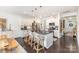 Modern kitchen with a granite island, white cabinets, and stainless steel appliances at 3267 Lock Erne Ave, Kannapolis, NC 28081