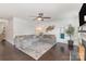 Bright living room with modern decor, ship lap accent wall, ceiling fan, and hardwood floors at 3267 Lock Erne Ave, Kannapolis, NC 28081