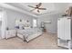 Spacious main bedroom featuring a tray ceiling, a large bed, and neutral tones for a serene atmosphere at 3267 Lock Erne Ave, Kannapolis, NC 28081