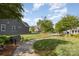 A serene neighborhood view with sidewalks, benches, and lush greenery, perfect for leisurely strolls and community engagement at 3267 Lock Erne Ave, Kannapolis, NC 28081