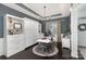 Elegant home office featuring stylish built-ins, a modern desk and dark hardwood flooring at 3267 Lock Erne Ave, Kannapolis, NC 28081