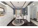 Stylish office with custom built-ins, a modern desk, and an elegant chandelier at 3267 Lock Erne Ave, Kannapolis, NC 28081