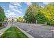 Street view within the neighborhood showcasing well-maintained landscaping and attractive homes at 3267 Lock Erne Ave, Kannapolis, NC 28081