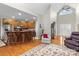 Comfortable living space featuring an open floorplan with views into the kitchen and foyer at 34843 Ellis Spring Ct, Albemarle, NC 28001