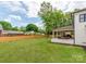 Large, well-maintained backyard with patio, offering ample space for relaxation and entertainment at 3501 Providence Rd, Charlotte, NC 28211