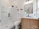 Modern bathroom features a walk-in shower, and a vanity with storage at 3501 Providence Rd, Charlotte, NC 28211