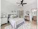 Comfortable bedroom with natural light, neutral colors, and a spacious closet at 3501 Providence Rd, Charlotte, NC 28211