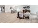 Open-concept dining area featuring stylish decor, modern lighting, and comfortable seating arrangements at 3501 Providence Rd, Charlotte, NC 28211