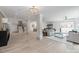 Spacious and inviting living room with a decorative chandelier, offering open layout and natural light at 3501 Providence Rd, Charlotte, NC 28211