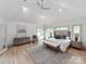 Bright main bedroom with vaulted ceiling, a ceiling fan, and a neutral color palette at 3501 Providence Rd, Charlotte, NC 28211