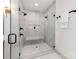 This luxurious shower offers dual shower heads, a built-in bench, and a sleek glass enclosure at 3501 Providence Rd, Charlotte, NC 28211