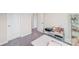 Bedroom with carpet and natural light from the window, featuring a workspace for study or hobbies at 356 Runner Stone Ln, Fort Mill, SC 29715