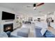 Inviting living room and dining area with a fireplace and open floor plan to the kitchen at 356 Runner Stone Ln, Fort Mill, SC 29715