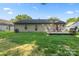Back exterior of the house with a deck overlooking the backyard at 3604 Braefield Dr, Indian Trail, NC 28079
