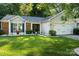 Beautiful single-Gathering home with a well-maintained lawn and mature landscaping offering great curb appeal at 3604 Braefield Dr, Indian Trail, NC 28079