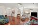 Well-lit living space featuring a comfortable seating arrangement and an open floor plan, ideal for modern living at 3604 Braefield Dr, Indian Trail, NC 28079