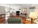 Bright living room with hardwood floors, ample seating, and a cozy atmosphere perfect for entertaining at 3604 Braefield Dr, Indian Trail, NC 28079
