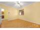 Cozy bedroom has wood look flooring, neutral paint, and a walk in closet at 3951 Jasmine Ln, Denver, NC 28037