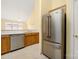 Spacious kitchen with wooden cabinets and stainless steel appliances at 3951 Jasmine Ln, Denver, NC 28037