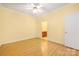 Bedroom with wood look floors, and an en-suite bath and walk in closet at 3951 Jasmine Ln, Denver, NC 28037
